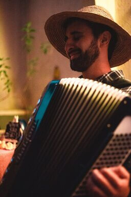 Tiago Madeira playing the accordion